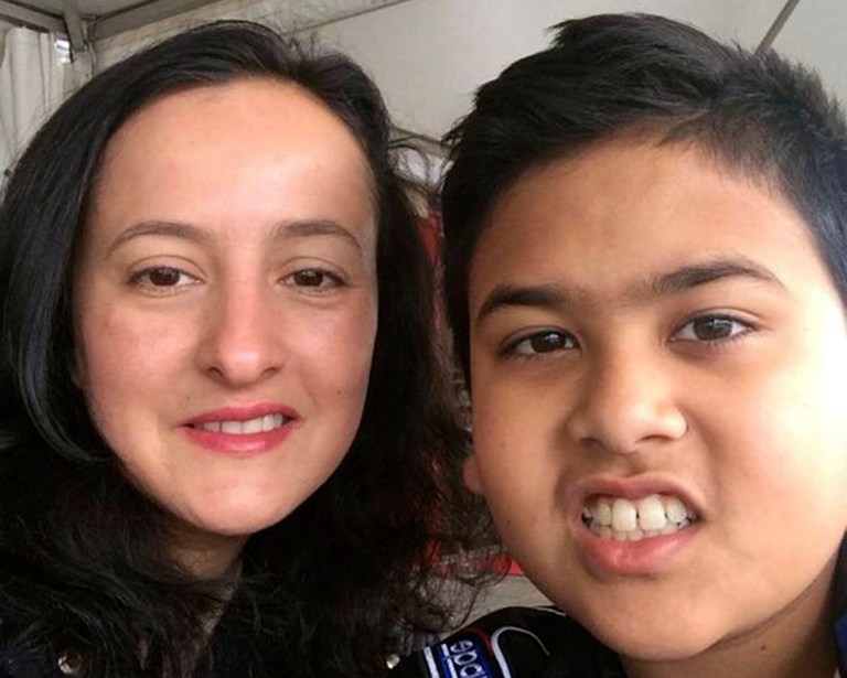 In this undated photo released by The Calehr family, Miguel Panduwinata, right, poses his mother Samira Calehr. Miguel and his brother Shaka Panduwinata were killed aboard Malaysia Airlines Flight 17, which was shot down over eastern Ukraine. (AP Photo/The Calehr family)