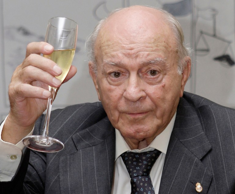 FILE - In this Nov. 13, 2009 file photo, former Real Madrid soccer star and the club's honorary president, Alfredo Di Stefano of Argentina raises his glass during a tribute to his contribution to sport at the Argentine Embassy in Madrid, Spain. Real Madrid on Monday July 7, 2014 says Alfredo Di Stefano has died at age 88. Di Stefano helped Madrid win five straight European Champions Cups, and was voted European player of the year in 1957 and '59. (AP Photo/Paul White, File)