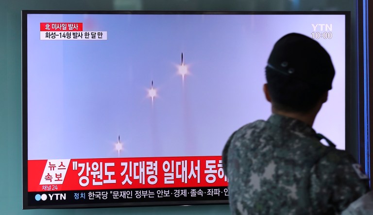 A South Korean soldier watches a TV screen showing a file footage of North Korea's missile launch at the Seoul Train Station in Seoul, South Korea, Saturday, Aug. 26, 2017. Three North Korea short-range ballistic missiles failed on Saturday, U.S. military officials said, which, if true, would be a temporary setback to Pyongyang's rapid nuclear and missile expansion. The banner at top reads: 