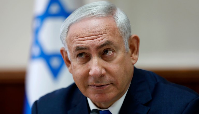 Israeli Prime Minister Benjamin Netanyahu delivered a warning to Russia, which has been Iran's partner in backing Syrian President Bashar Assad, during a meeting in Tel Aviv on Tuesday. (Abir Sultan/Pool Photo via AP)