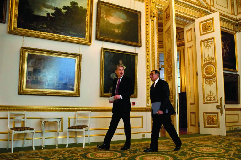 U.S. Defense Secretary Leon Panetta and Britain's Secretary of State for Defense Philip Hammond arrive for a news conference at Lancaster House in London on Saturday, Jan. 19, 2013. (AP Photo/Jacquelyn Martin)