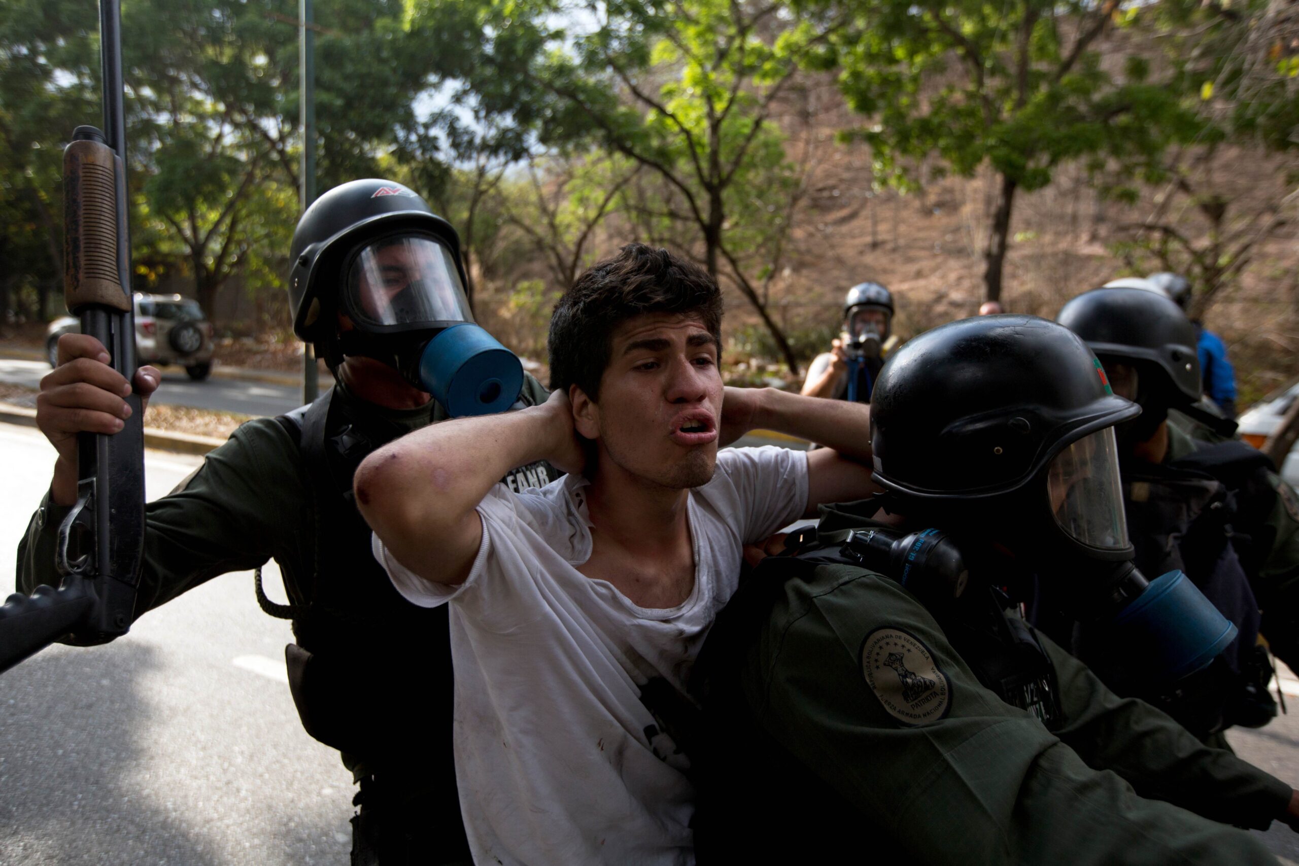 Scores of Venezuelans march against government