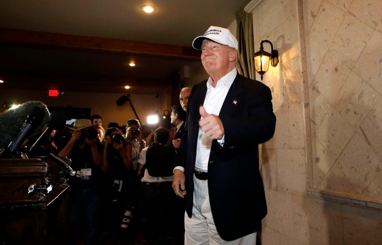 Republican presidential hopeful Donald Trump smiles after speaking to supporters and the media in Laredo, Texas, Thursday. (AP Photo/LM Otero)