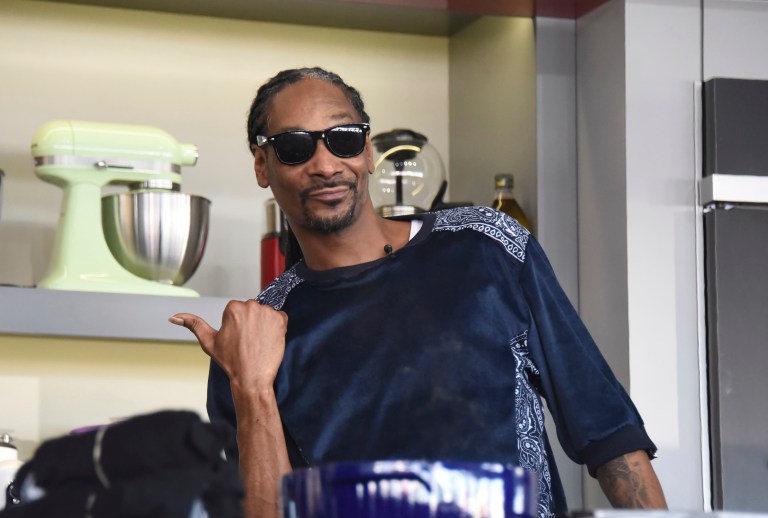 Snoop Dogg couldn't help but comment when someone suggested that President Trump can be a reasonable person. (Photo by Michele Eve Sandberg/Invision/AP)