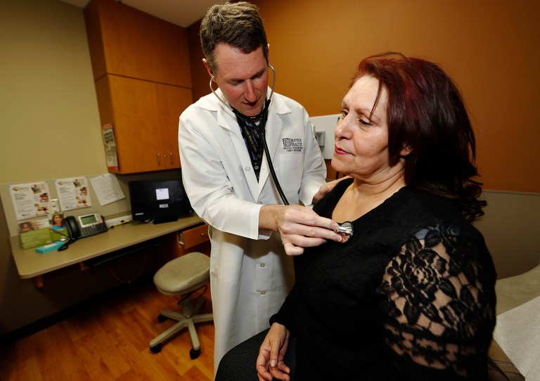 The Medicaid expansion is already facing massive budget overruns and crowding out resources for the needy. (AP Photo/David Zalubowski)