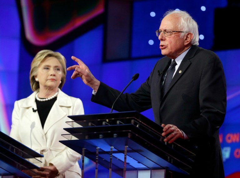 Hillary Clinton gets 50 percent of support from Democratic primary voters, compared to 48 percent for Bernie Sanders, a new NBC News/Wall Street Journal poll released Monday shows. (AP Photo)