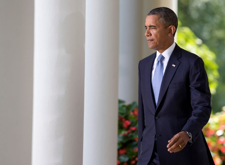   President Barack Obama arrives to deliver remarks about the crisis in Syria in the Rose Garden of the White House on Saturday, Aug. 31, 2013 in Washington. Obama says he has decided that the United States should take military action against Syria in response to a deadly chemical weapons attack. But he says he will seek congressional authorization for the use of force. (AP Photo/Evan Vucci)  