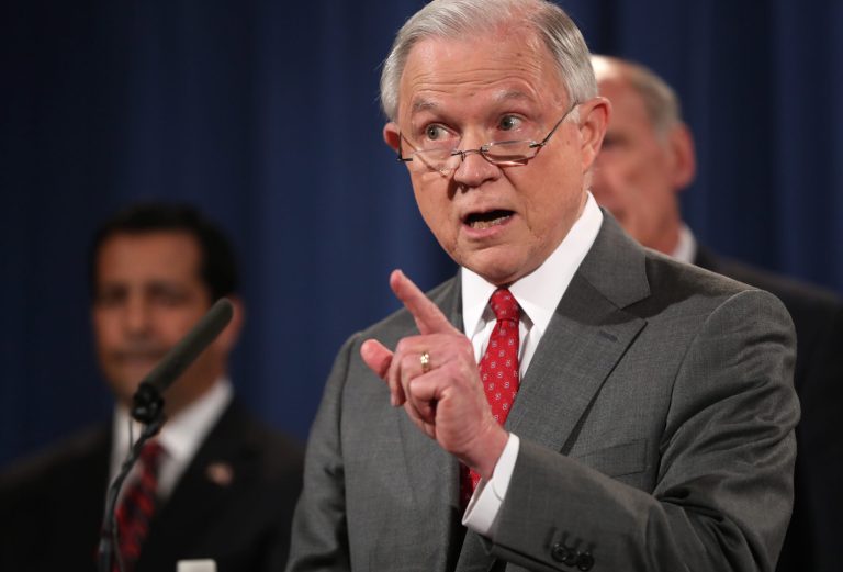 FILE - In this Aug. 4, 2017 file photo, Attorney General Jeff Sessions, speaks during a news conference at the Justice Department in Washington. As Chicago Mayor Rahm Emanuel took his fight against President Donald Trump's immigration policies to federal court, Monday, Aug. 7, 2017, Sessions hit back at Chicago, saying the Trump administration 