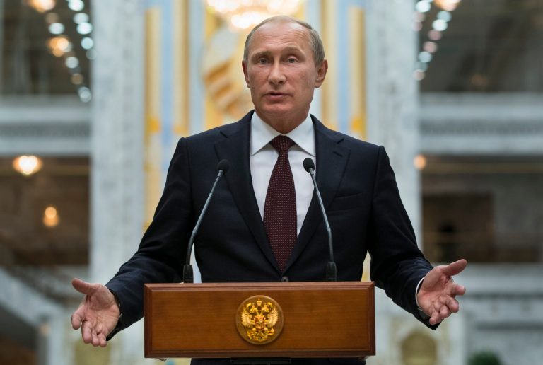 Russian President Vladimir Putin speaks with the press after meeting with Ukrainian President Petro Poroshenko in Minsk, Belarus on Wednesday. Putin said there was no talk of a cease-fire because Russia is not part of the conflict. (AP Photo/Alexander Zemlianichenko)