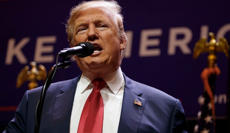 The top tiers of the country have been flourishing nicely, while those underneath have been taking a beating. And one reason is international trade. (AP Photo/ Evan Vucci)