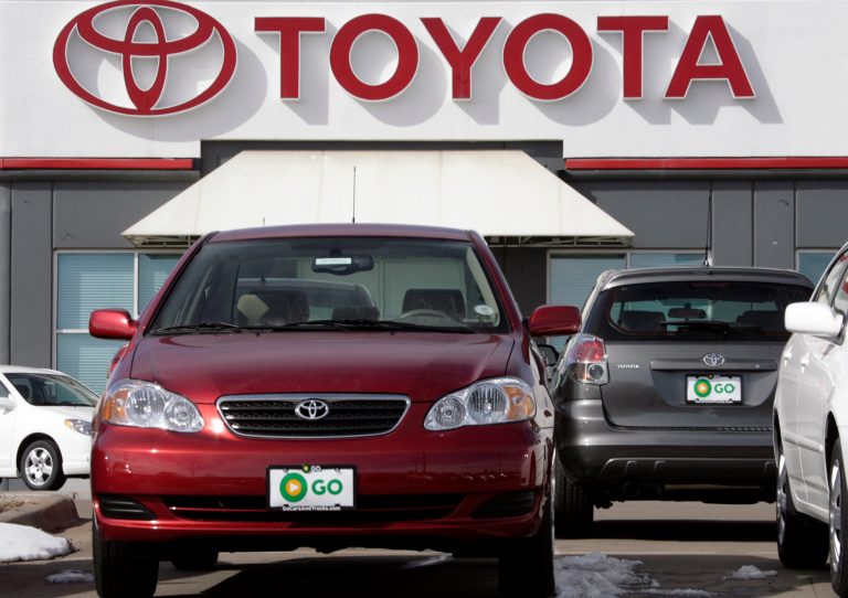 FILE - In this Feb. 5, 2007 file photo, a 2007 Toyota Corolla sedan, left, sits on the lot at a Toyota dealership in the southeast Denver suburb of Centennial, Colo. U.S. safety regulators are looking into a consumer's petition alleging that Toyota Corollas from the 2006 to 2010 model years can accelerate unexpectedly at low speeds and cause crashes. (AP Photo/David Zalubowski, File)