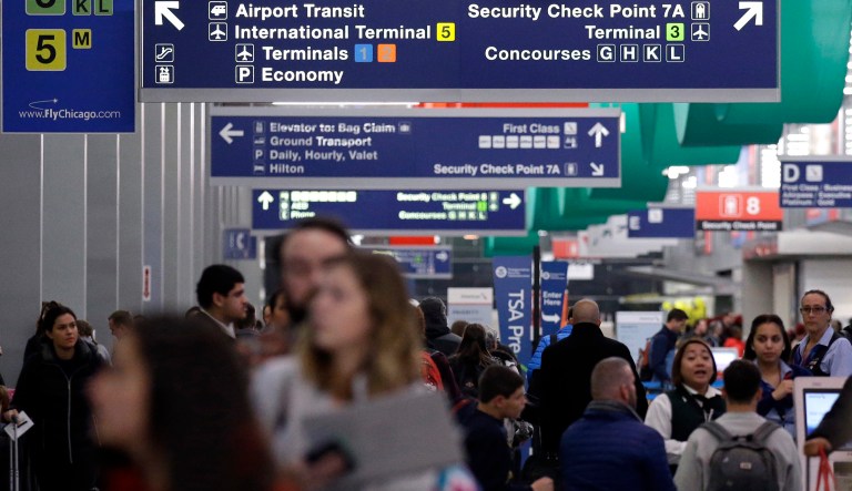 Exactly 2,609,372 passengers passed through TSA checkpoints on Sunday, making it the fifth-busiest day since the agency was established 16 years ago. (AP Photo/Nam Y. Huh)