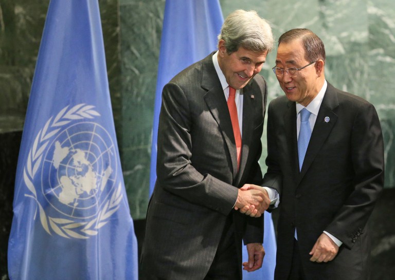 United States Secretary of State John Kerry shakes hands with United Nations Secretary-General Ban Ki-moon during a ceremony to mark more signatories to the Paris climate accords. (AP Photo/Seth Wenig)