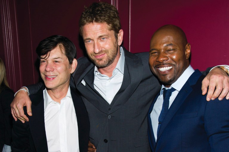 Charles Sykes/Invision via AP
Alan Siegel, left, Gerard Butler and director Antoine Fuqua attend the after party for a screening of FilmDistrict's 
