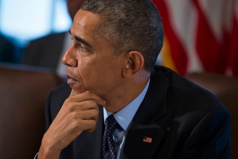 President Obama pauses as he speaks to the media before a meeting with his cabinet members in the White House Cabinet Room on Friday. (AP/Evan Vucci)