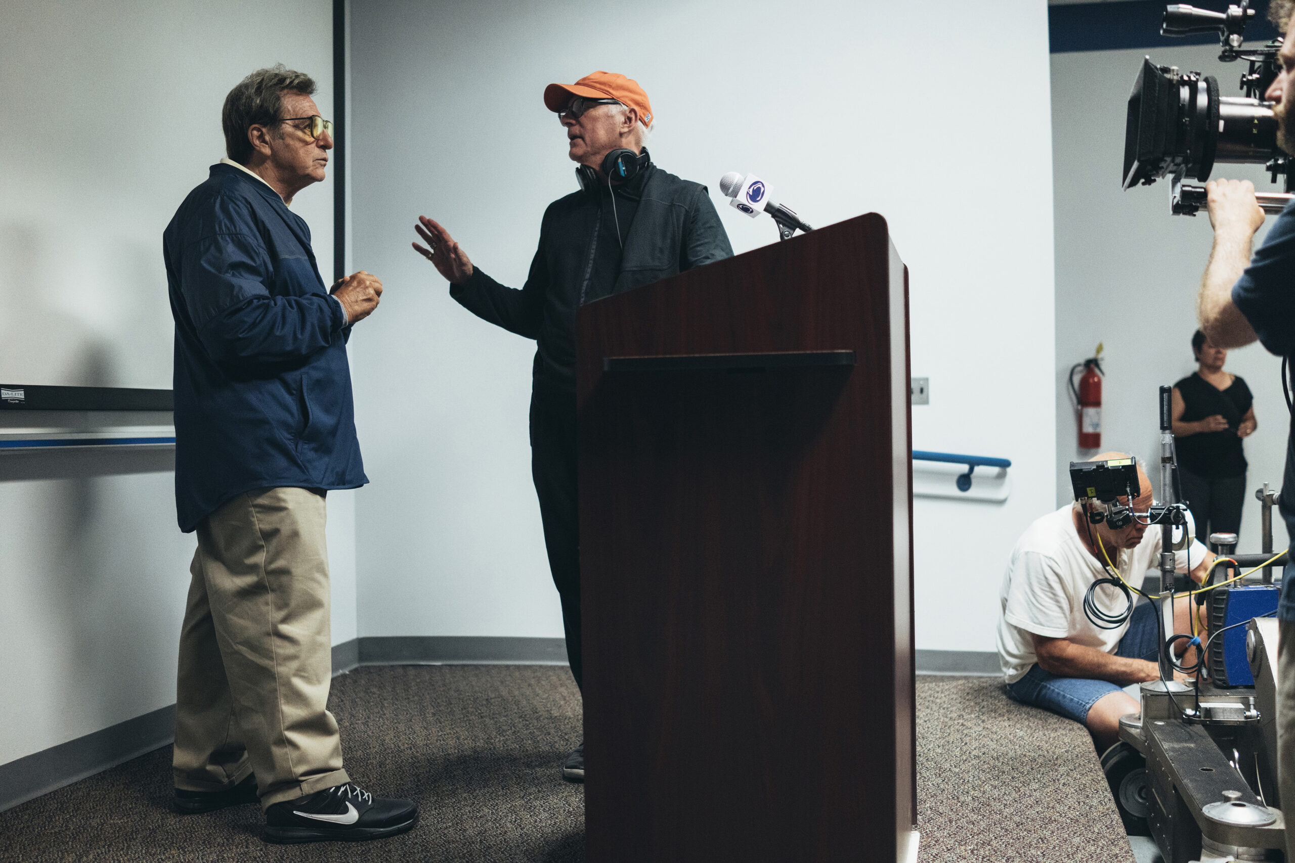 Al Pacino and Barry Levinson on the set of 'Paterno'