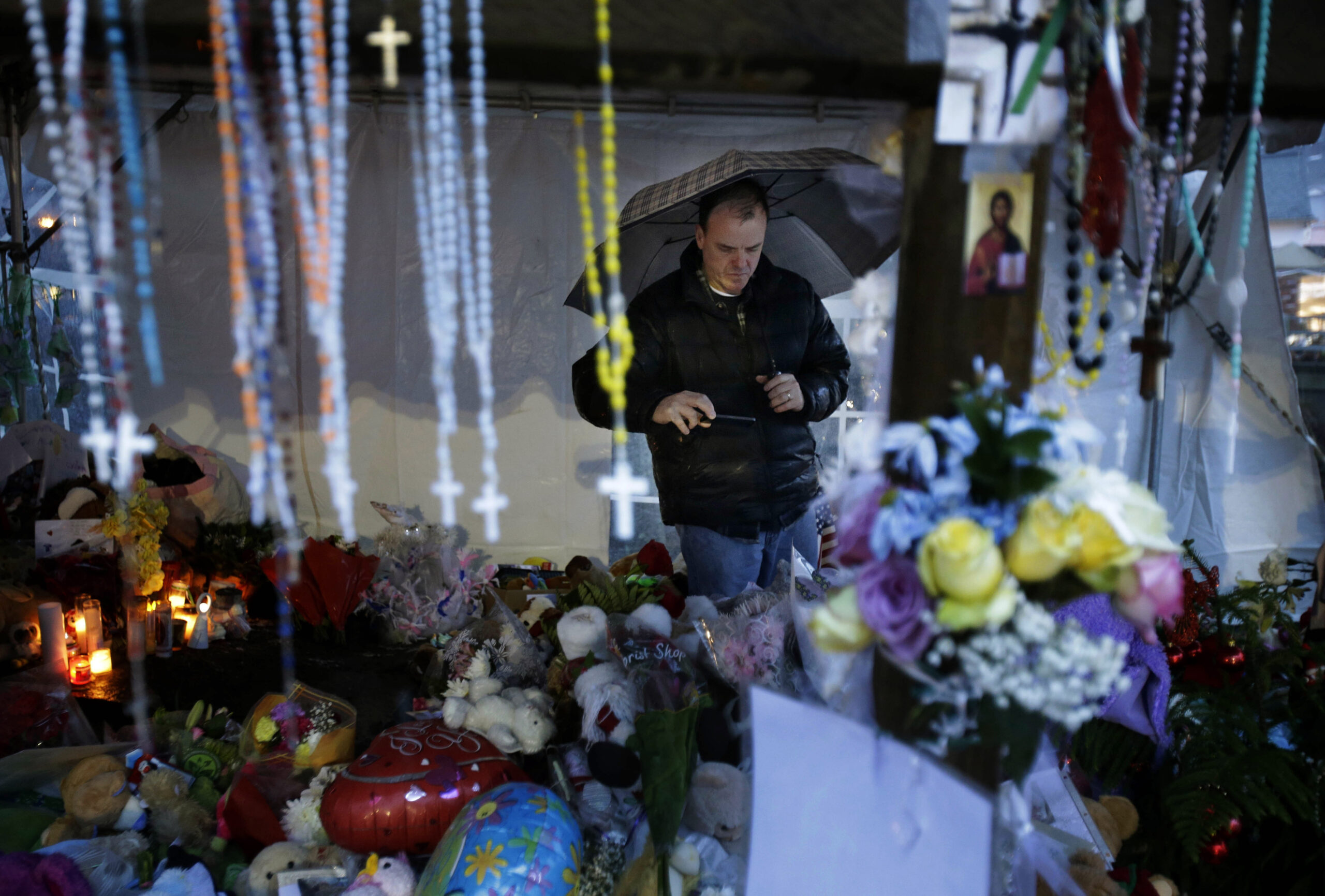 Bells toll for victims one week after shooting