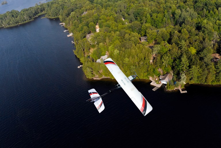 This photo provided by PrecisionHawk shows the Lancaster Hawkeye Mk III drone over water. Federal regulators have approved drone research flights at a central New York airport, one of six sites nationally chosen to assess the safety of the aerial robots in already busy skies. The other mission at Griffiss International Airport in Rome, NY, will be to study how drones can help farmers stay on top of pests, weeds and the conditions of their crops. (AP Photo/PrecisionHawk)