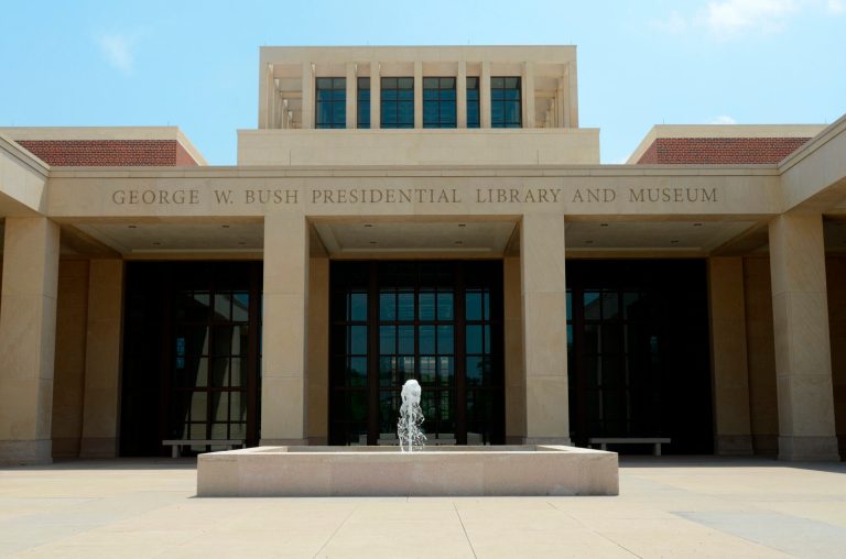 In this photo taken April 16, 2013, the main entrance courtyard is shown at the George W. Bush Presidential Library and Museum in Dallas. The museum uses everything from news clips to interactive screens to artifacts to tell the story of Bush's eight years in office. The George W. Bush Presidential Center, which includes the library and museum along with 43rd president's policy institute, will be dedicated Thursday on the campus of Southern Methodist University in Dallas. (AP Photo/Benny Snyder)