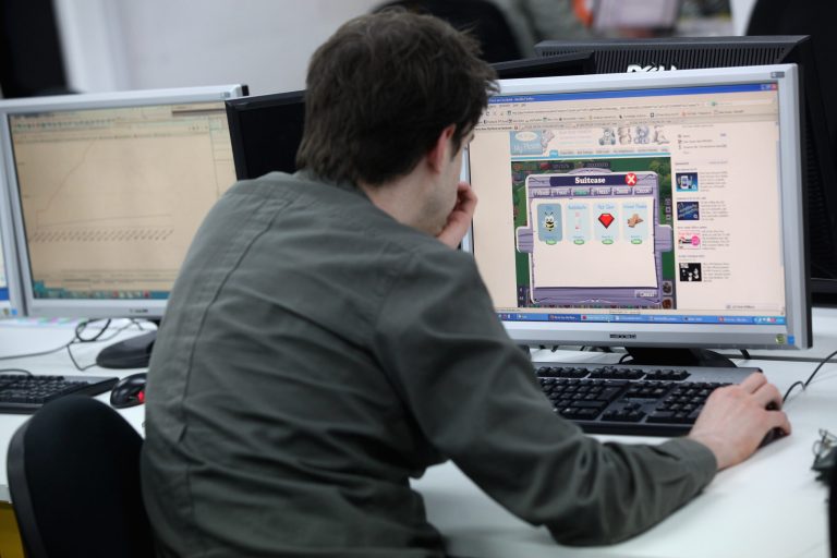 A man works at a computer in TechHub, an office space for technology start-up entrepreneurs, near the Old Street roundabout in Shoreditch which has been dubbed 'Silicon Roundabout' due to the number of technology companies operating from the area on March 15, 2011 in London, England. (Photo by Oli Scarff/Getty Images)