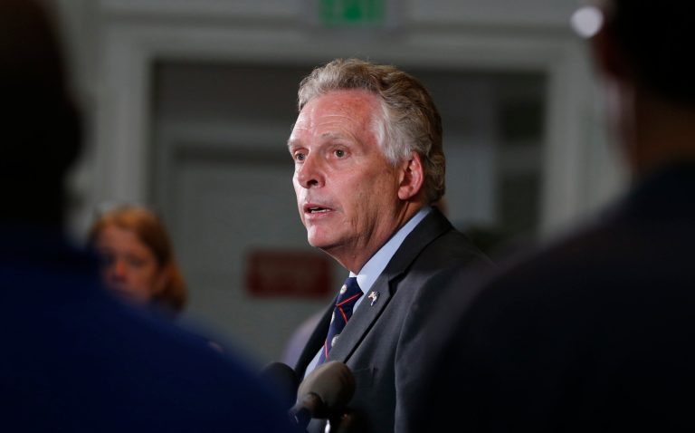 Virginia Gov. Terry McAuliffe addresses a news conference concerning the white nationalist rally and violence against it in Charlottesville, Va., Saturday, Aug. 12, 2017. (AP Photo/Steve Helber)