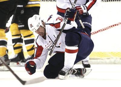 Capitals strike in overtime, to beat the Bruins