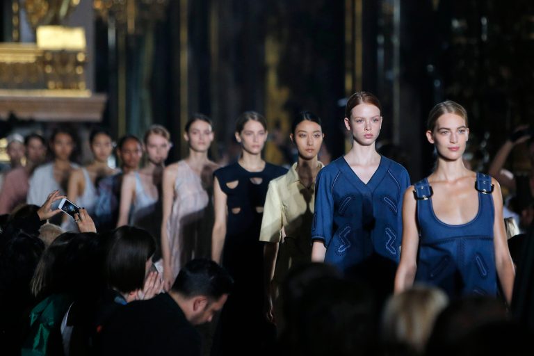 Models wear creations as part of Stella McCartney's Spring/Summer 2015 ready-to-wear fashion collection presented in Paris, France, Monday, Sept. 29, 2014. (AP Photo/Thibault Camus)