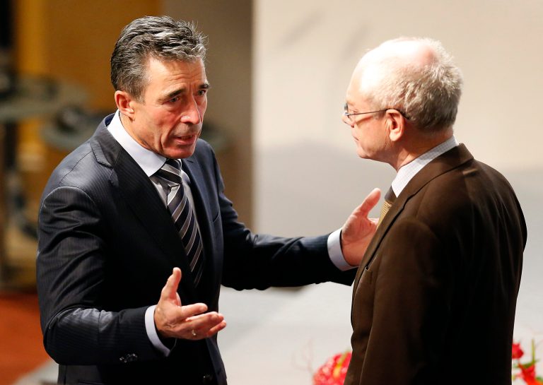 NATO secretary General Anders Fogh Rasmussen, left, and European Council President Herman Van Rompuy chat during the 50th Security Conference in Munich, Germany, Saturday, Feb. 1, 2014. A three-day security meeting continues. (AP Photo/Frank Augstein)