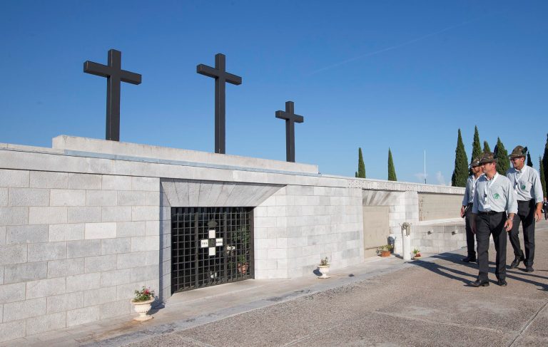 Italian alpine soldiers walk in front in Redipuglia's war memorial, Italy, Sunday, July 6, 2014.  The 100th anniversary  of World War I's outbreak will be marked by Maestro Riccardo Muti by leading a youth orchestra in Redipuglia, site of the monument to World War I dead in northeastern Italy,  in a performance of Verdi's 