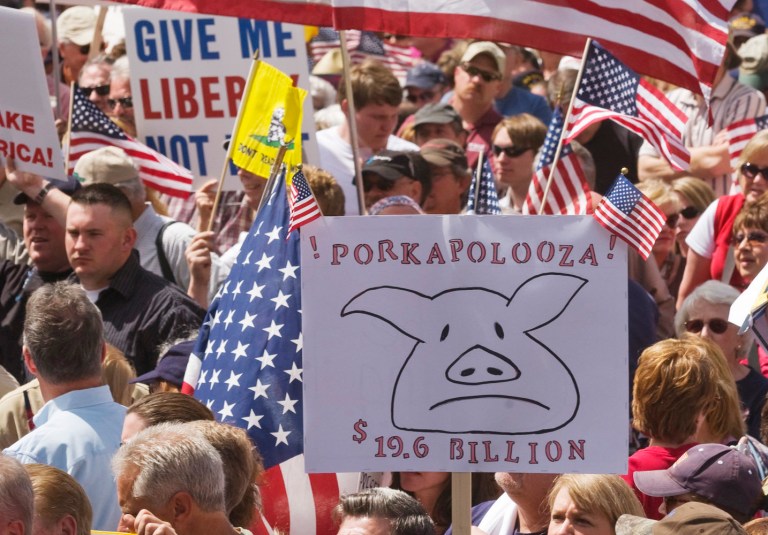 People gather at the Capitol on April 15, 2009, as part of a nationwide protest of taxes and the governments usages. (AP/Peter M. Fredin)