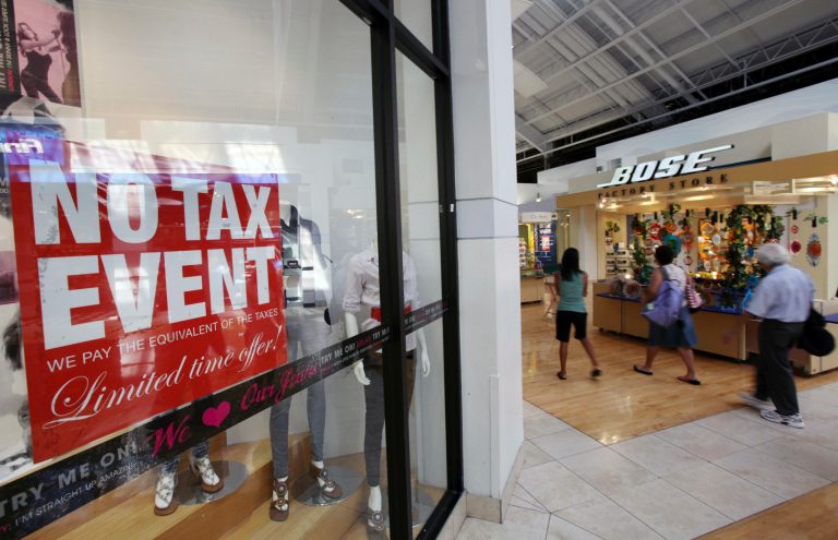 Rather than actually boosting sales, studies show tax holidays simply shift the timing of purchases that would have already happened.Â (AP Photo/Wilfredo Lee)