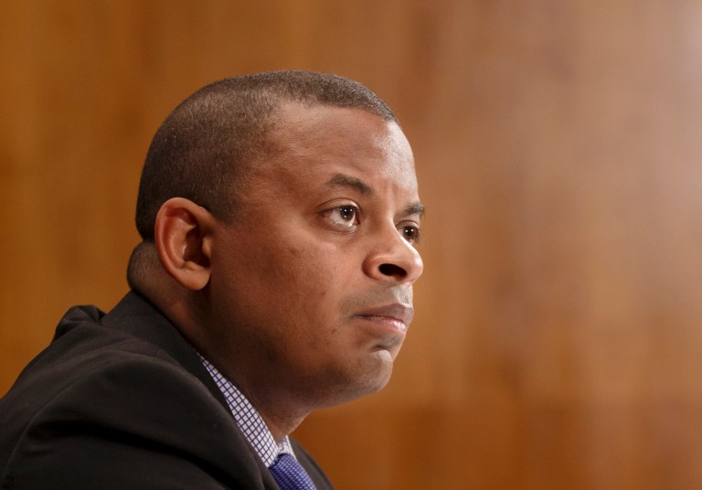 FILE - This March 13, 2014 file photo shows  Transportation Secretary Anthony Foxx on Capitol Hill in Washington. The Obama administration is sending a four-year, $302 transportation plan to Congress, hoping to jump-start a national debate on how to repair and replace the nation's aging infrastructure and accommodate the needs of a growing population. Foxx said Tuesday that action is urgently needed because the federal Highway Trust Fund is expected to run dry by late August. He said that unless Congress acts to shore up the fund, transportation aid to states will be held up and workers laid off construction sites across the country.  (AP Photo/J. Scott Applewhite, File)