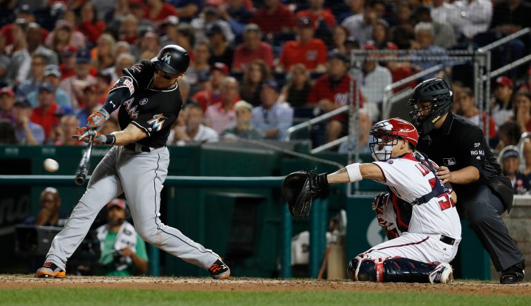 Baseball fans booed Health and Human Services Secretary Tom Price when he threw the first pitch at the Washington Nationals baseball game against the Miami Marlins Wednesday evening. (AP Photo/Carolyn Kaster)