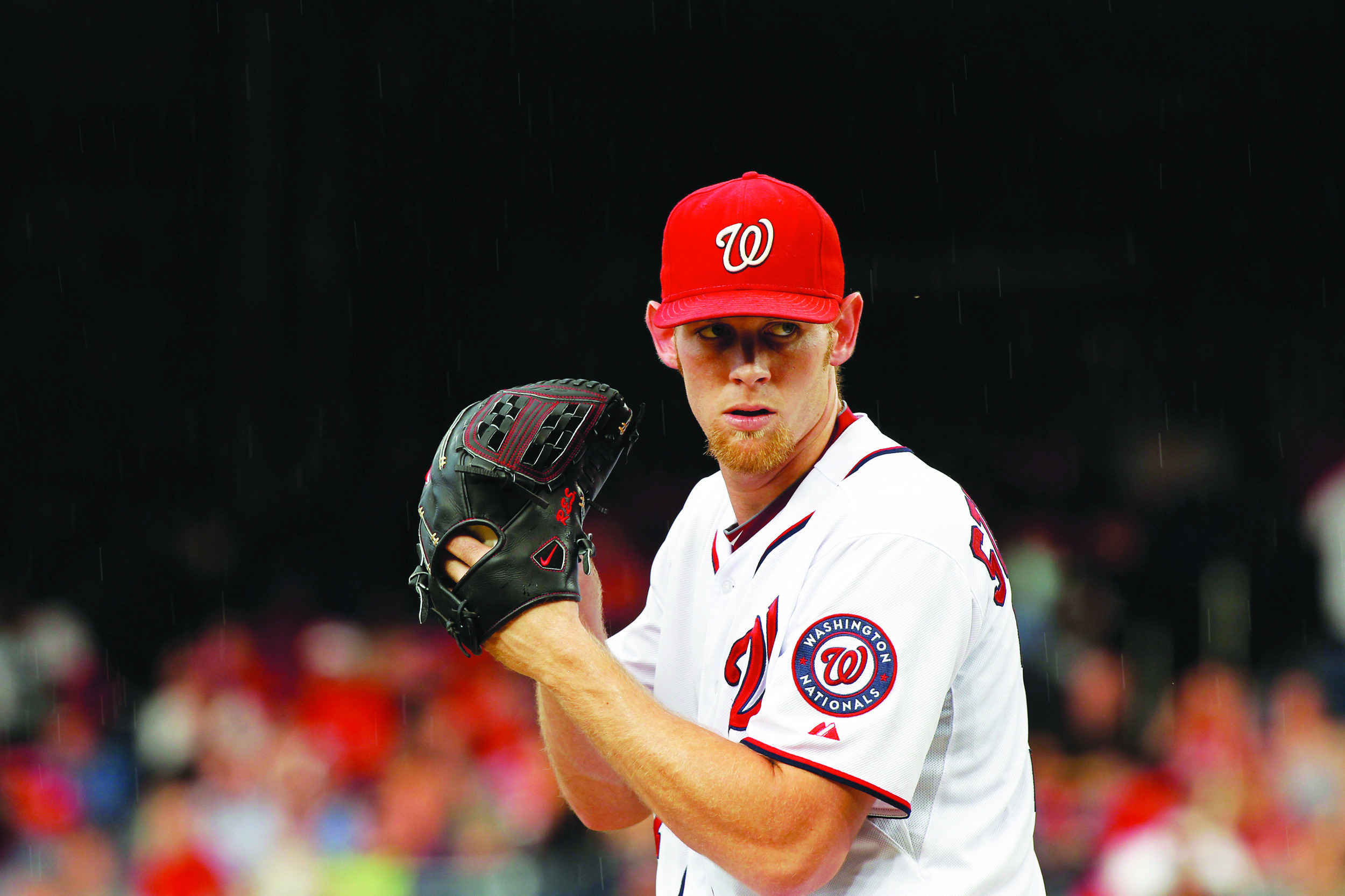 Strasburg, Nationals stand up to storm in 4-1 win over Braves