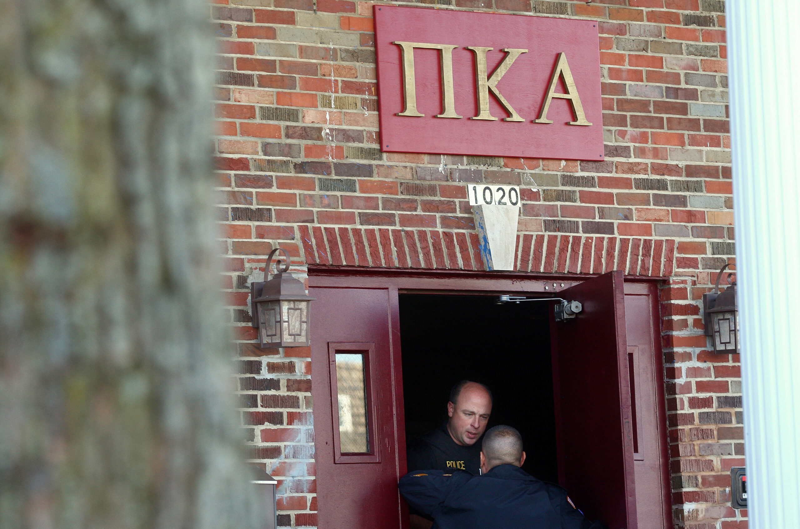 13 surrender in Illinois fraternity drinking death