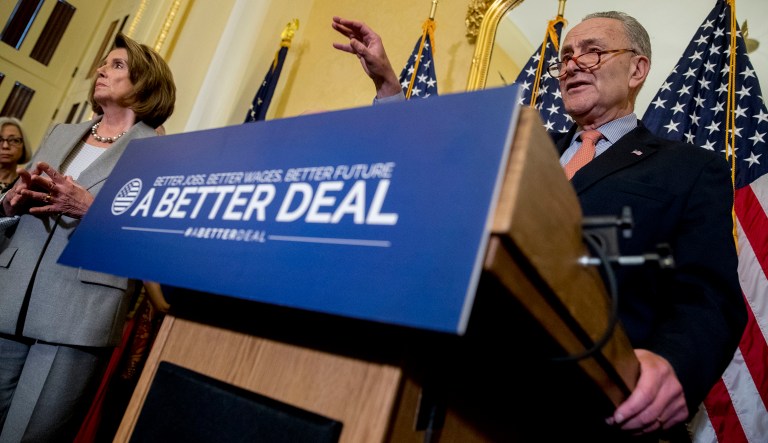 Senate Minority Leader Sen. Chuck Schumer of N.Y., right, accompanied by House Minority Leader Nancy Pelosi of Calif., left, speaks at a news conference on American labor on Capitol Hill in Washington, Wednesday, Nov. 1, 2017. (AP Photo/Andrew Harnik)
