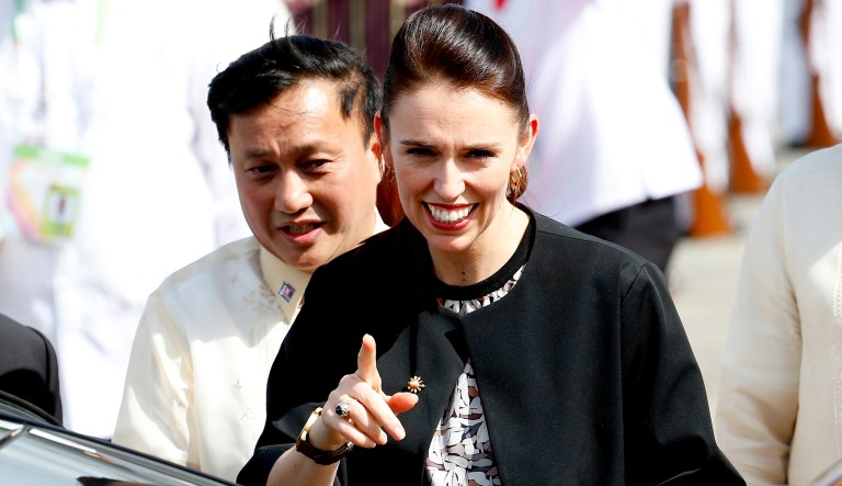 New Zealand Prime Minister Jacinda Ardern gestures upon arrival at Clark International Airport in Clark, Pampanga province, north of Manila, Philippines Sunday, Nov. 12, 2017. Prime Minister Ardern was one of more than a dozen leaders who attended the 31st ASEAN Summit and Related Summits in Manila. (AP Photo/Bullit Marquez)