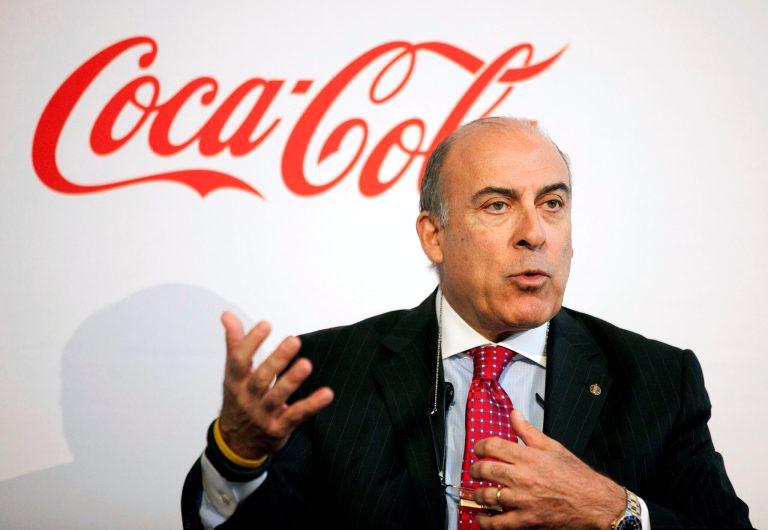 FILE - In this May 8, 2013 file photo, Coca-Cola CEO Muhtar Kent speaks during a news conference in Atlanta. Coca-Cola is revising its pay plan for executives after shareholders including Warren Buffett expressed disapproval and called it excessive. (AP Photo/David Goldman, File)