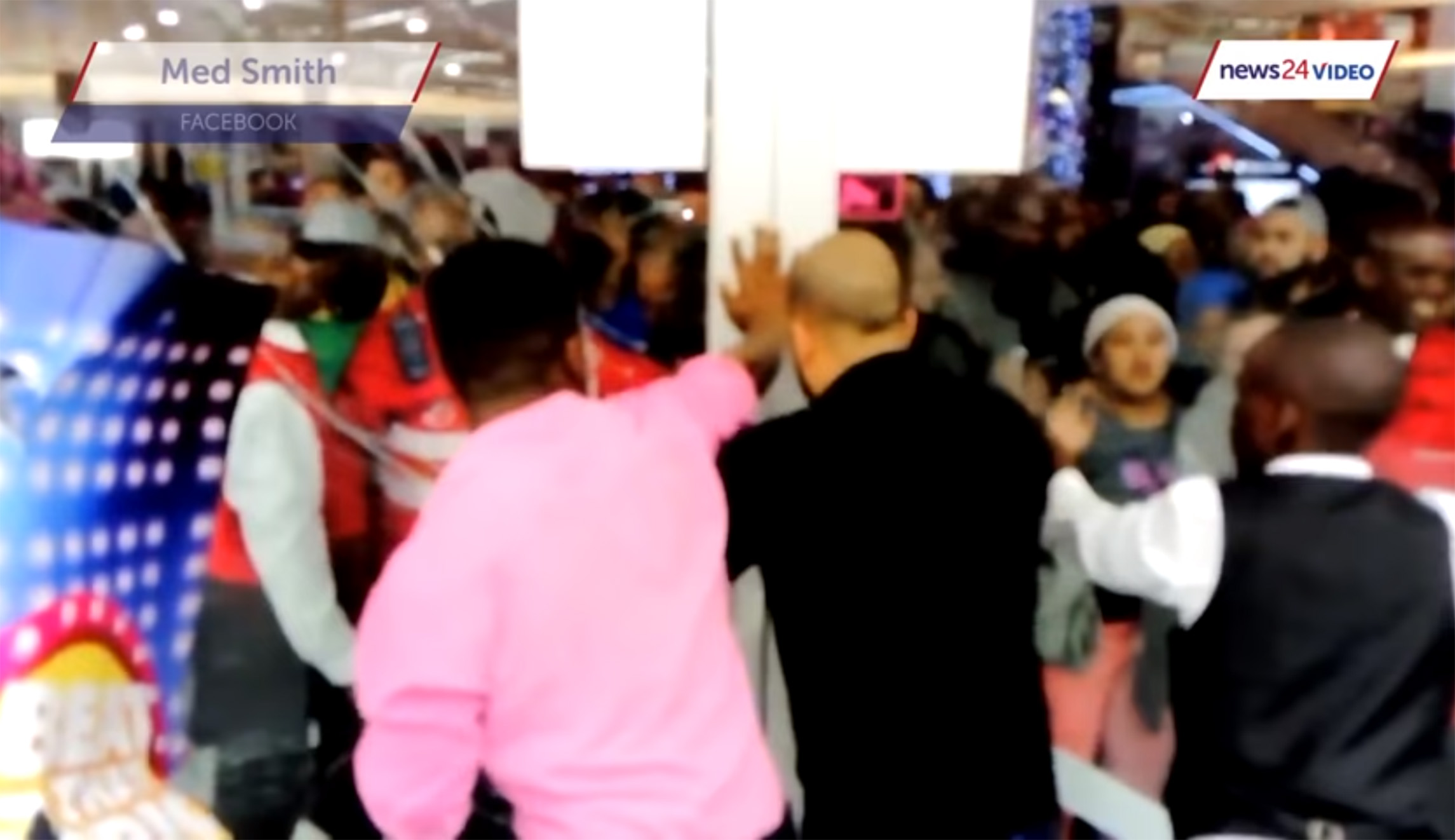 Black Friday madness goes global when shoppers in South Africa shatter glass in department store surge