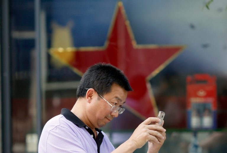 Traditional news outlets no longer allowed to use what government terms online 'hearsay.' (AP Photo/Ng Han Guan)