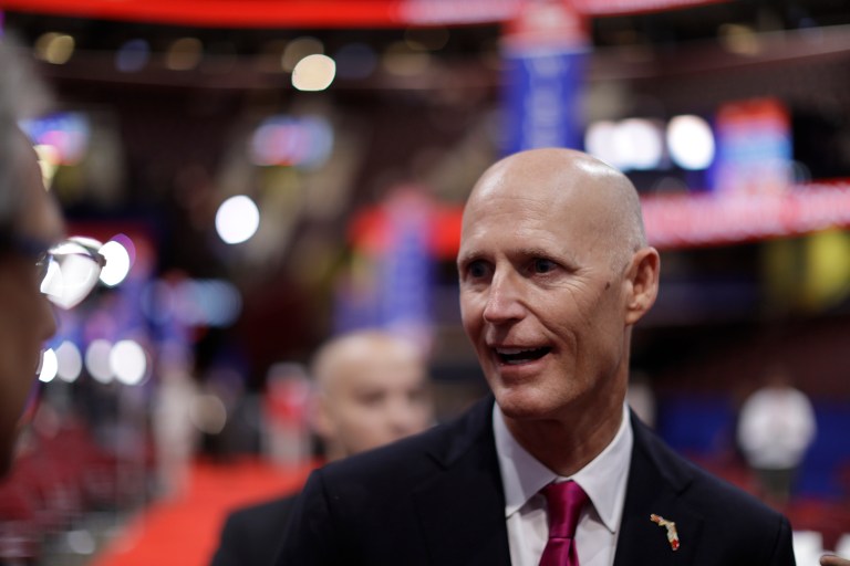 "We're going to make sure Donald Trump wins," Florida Gov. Rick Scott said. (AP Photo/Matt Rourke)