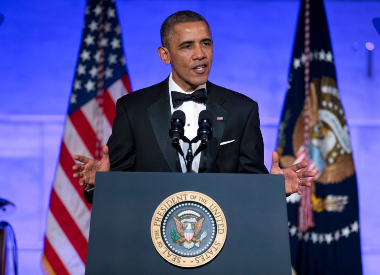 President Barack Obama gestures as he speaks during a dinner in honor of the Presidential Medal of Freedom awardees at the Smithsonian Museum of American History on Wednesday, Nov. 20, 2013 in Washington. (AP Photo/ Evan Vucci)