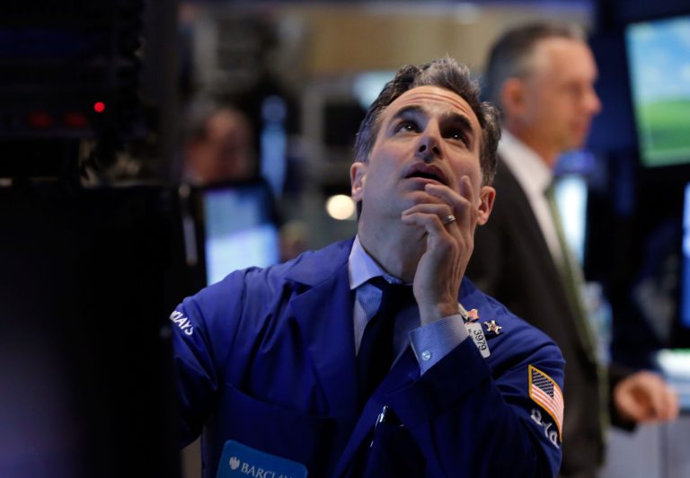 Specialist Anthony Rinaldi works at his post on the floor of the New York Stock Exchange, Friday, April 11, 2014. Weaker earnings at JPMorgan Chase are dragging bank stocks lower in early trading.Technology and biotech stocks also fell, a day after the worst rout for the Nasdaq composite index since 2011.(AP Photo/Richard Drew)
