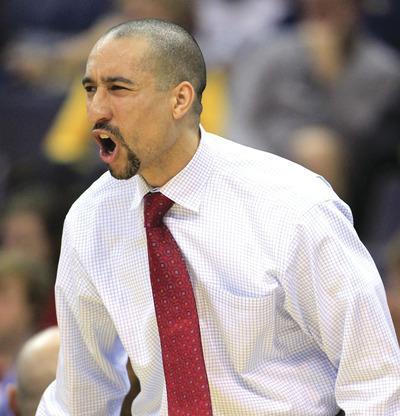 Virginia Commonwealth head coach Shaka Smart reacts to a play during the second half of an NCAA college basketball game against George Washington at the BB&T Classic in Washington, Sunday, Dec. 4, 2011. VCU won 75-60.(AP Photo/Luis M. Alvarez)