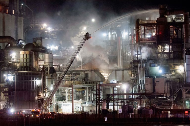 Peoria firefighters attack a fire with an aerial truck at the Archer Daniels Midland plant in Peoria, Ill. (AP Photo/Journal Star, Adam Gerik,File)
