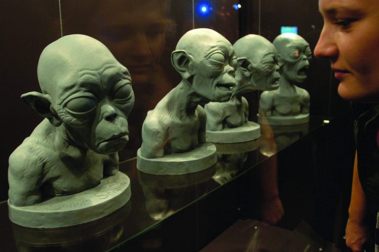 FILE - In this Jan. 30, 2007 file photo, a visitor looks at original studies of 