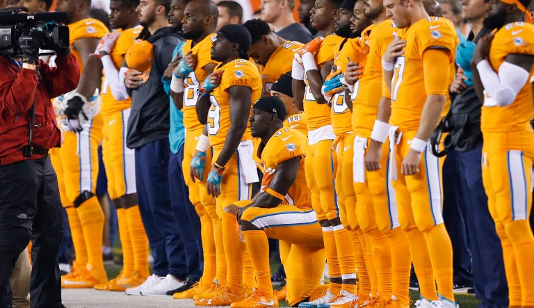 When President Trump tweeted criticism of those kneeling for the anthem in the 2017 football season, Michael Thomas told reporters he did what he thought he needed to do to make a change. (AP Photo/Gary Landers)