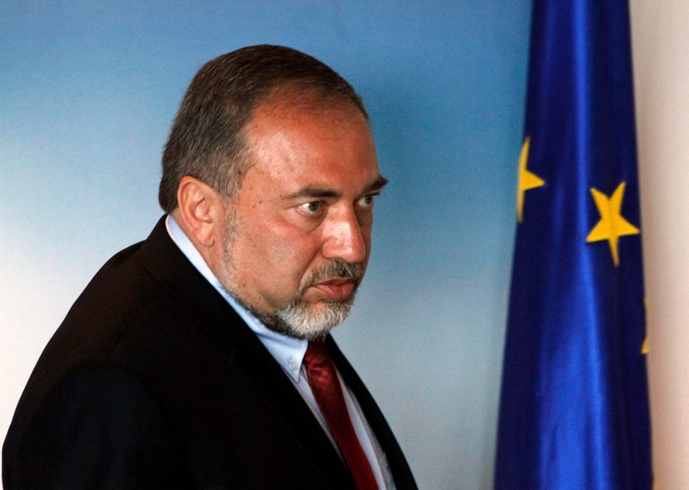   FILE - In this Tuesday, April 17, 2012 file photo, Israeli Foreign Minister Avigdor Lieberman leaves a press conference after meeting with Cyprus foreign minister Erato Kozakou Marcoullis, unseen, at Foreign house in Nicosia, Cyprus. Lieberman was formally indicted on Sunday, Dec. 30, 2012 on charges of breach of trust and fraud, allegations that could hurt his political future if he is convicted. (AP Photo/Petros Karadjias, File)  