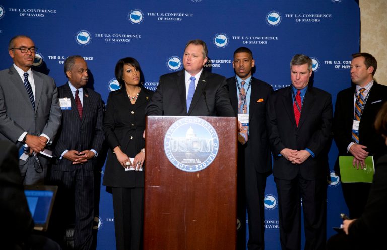 U.S. Conference of Mayors president, Mayor Scott Smith, of Mesa, Ariz., speaks during the opening press conference of the 82nd winter meeting of the U.S. Conference of Mayors on Wednesday in Washington. The nation's mayors say U.S. cities have largely rebounded since the economic downturn and want Congress to work together to bring more stability to the financial markets. From left, Mayor Mike Coleman, of Columbus, Ohio, Mayor Bill Bell, of Durham, N.C., Mayor Stephanie Rawlings-Blake, of Baltimore, Md., Smith, Mayor Kevin Johnson, of Sacramento, Calif, Mayor Brian Wahler, of Piscataway, N.J. and Mayor Shane Bemis, of Gresham, Oregon. (AP/ Evan Vucci)