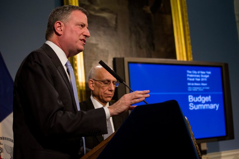 New York City Mayor Bill de Blasio unveiled his first budget proposal Wednesday, revealing that the nation's largest city has a surplus but warning that it still faces stark fiscal challenges due to the expired labor contracts of all 150 municipal unions. (AP Photo/Craig Ruttle, Pool)